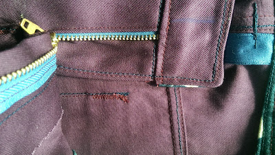 fly detail on purple seagull jeans