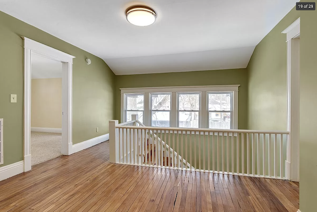 color photo of wood floors and staircase and upstairs landing inside 1960 Prospect Avenue SE, Grand Rapids, Michigan, a childhood home of President Gerald R. Ford (originally 1960 Terrace SE)