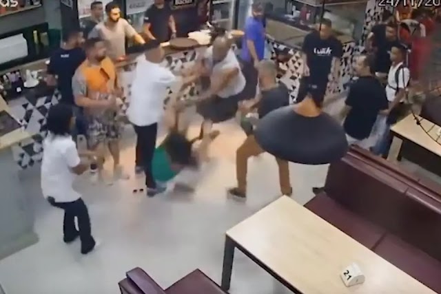 Vídeo: mulher é agredida por homem com socos e empurrão em bar