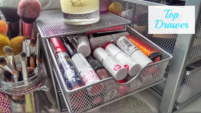Top storage drawer for lipstick