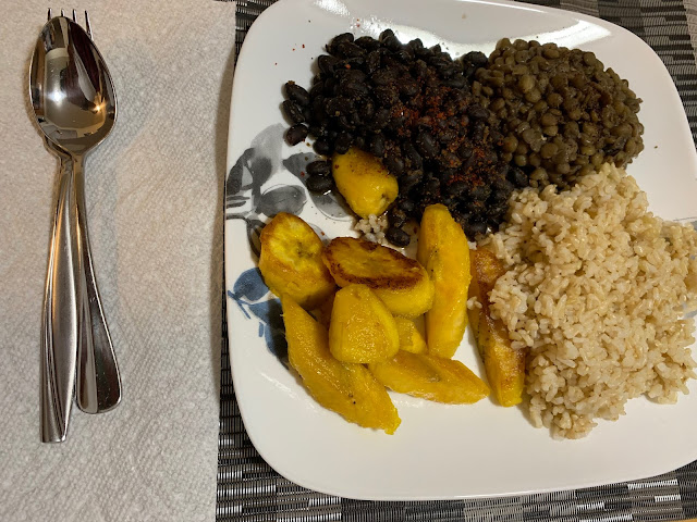 Black beans and green lentils with brown rice and sauteed plantains.