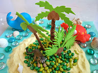 http://funprojectsforyourkids.blogspot.com/2015/05/tropical-island-sensory-bin.html