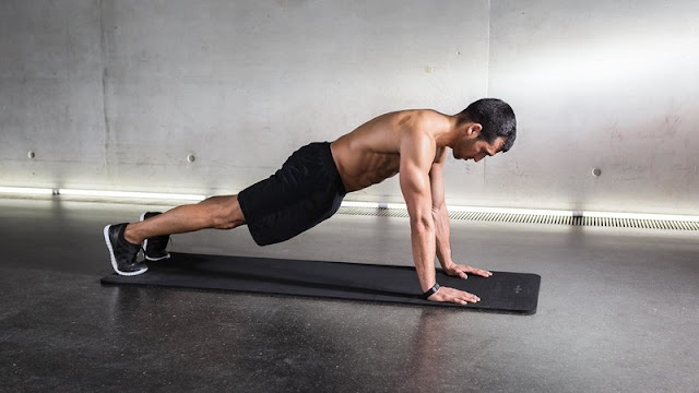 Fitness Athlete doing High Plank