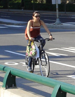 tank top and jeans on a bike