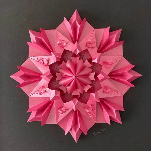 pink flower-like modular origami wall art