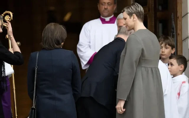 Princess Charlene wore a mixed trapezoid embroidery gown by Akris. Princess Caroline, Princess Stephanie and Charlotte Casiraghi