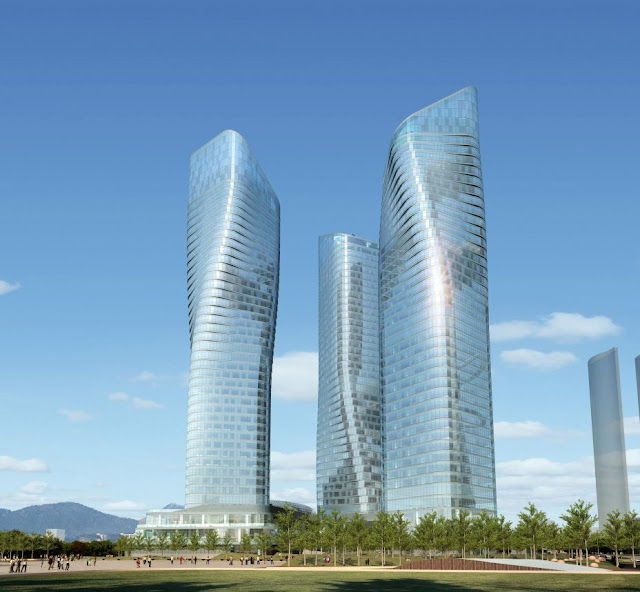 Picture of Dancing Towers as seen from the street with vegetation and landscape