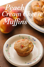 Food Lust People Love: Sweet Peach Cream Cheese Muffins celebrate the best of summer peaches with a wonderfully subtle tang. They are perfect for a summertime brunch, breakfast or snack.