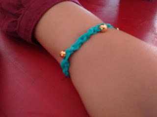 Top Ender wearing her bracelet