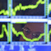 Stock market ends mixed after uneven earnings news...