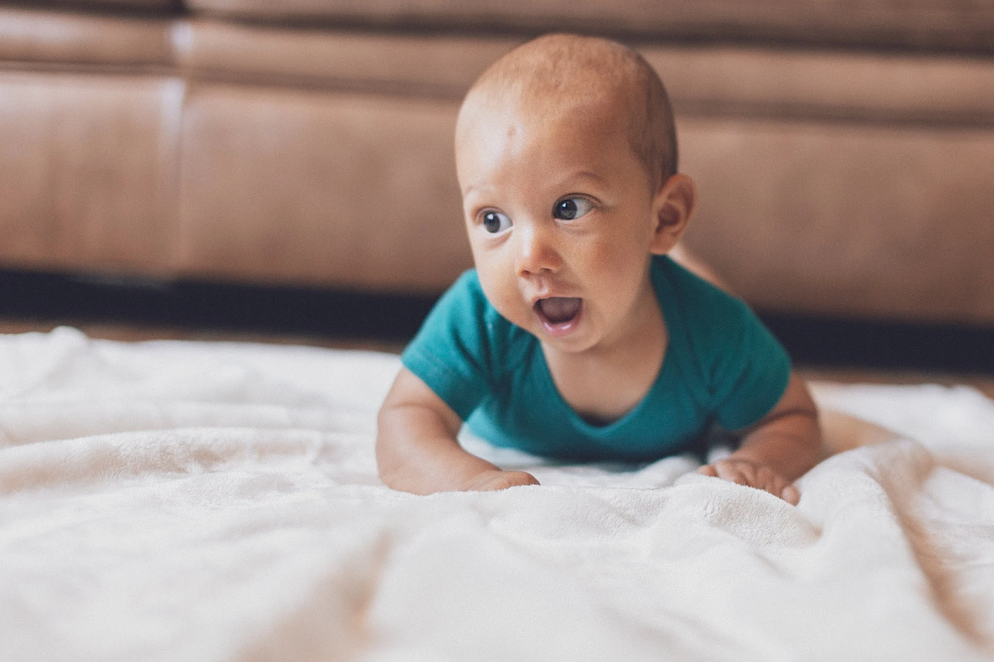 Baby on a bed. Free stock Photo by Craig Adderley from Pexels