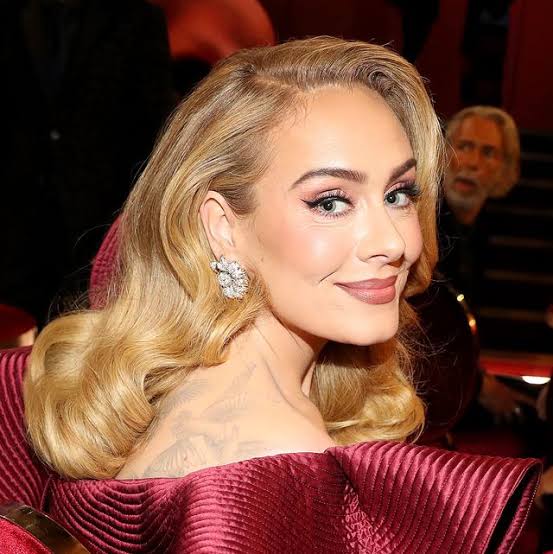 Adele concedes she could do without 'being popular's as she makes sense of explanation for viral cantankerous image