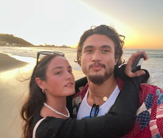 Charles Melton clicking a selfie with his girlfriend Chase Sui Wonders