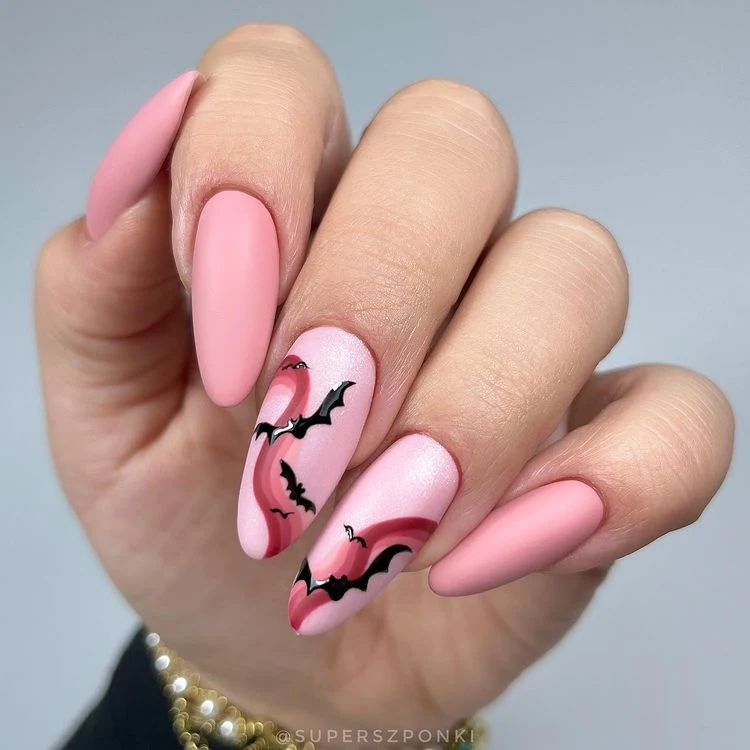 Pink Spooky season nail art