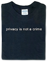 Black t-shirt that reads, privacy is not a crime