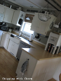 Chipping with Charm:  Small Kitchen with Junky Details...http://chippingwithcharm.blogspot.com/