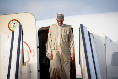 Buhari says 'I am fit', challenges reporter to a wrestling competition 