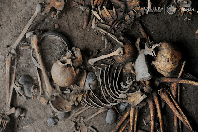 2,500-year-old mutliple burial with interlocked skeletons found in Mexico