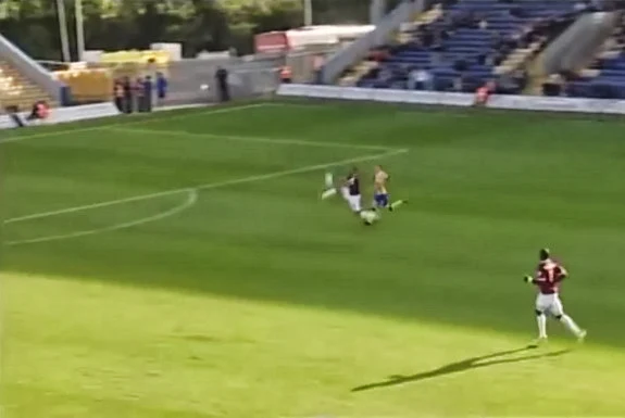 Northampton's Mathias Kouo-Doumbé miscues his clearance to score an own goal against Mansfield