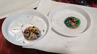 cookies decorated with ganache and sprinkles
