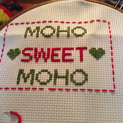 Cross-stitch embroidery saying Moho sweet moho