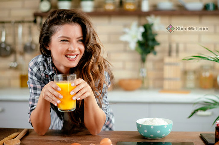 Girl Drinking Juice Stock Image