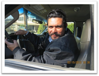 Rudy Reyes, Supervisor, Unity Disposal, LLC, in his truck.
