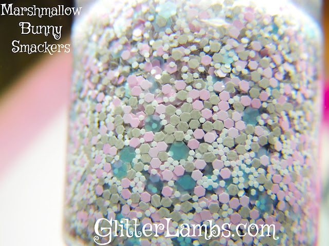 Here is the bottle shot of Glitter Lambs "Marshmallow Bunny Smackers" glitter topper nail polish. I took this picture inside under a lamp light.