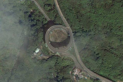 built the Kawazu-Nanadaru Loop Bridge, also known as the Japanese Double loop spiral, in Kawazu, Japan. This double spiral brings cars up and down a full 45 meters while being seemingly suspended in a valley between two mountainsides. The spirals measure 80m in diameter and the whole ramp section is 1.1km long.