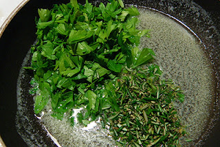 Parsley and Rosemary Sauteing in Butter