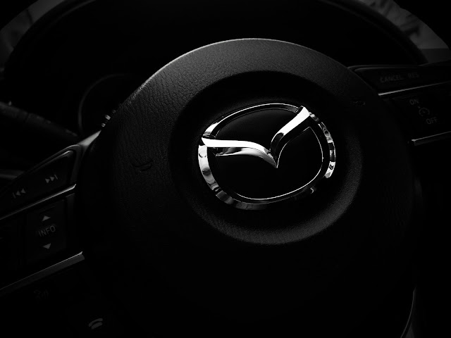 revolusi perubahan logo Mazda yang memukau