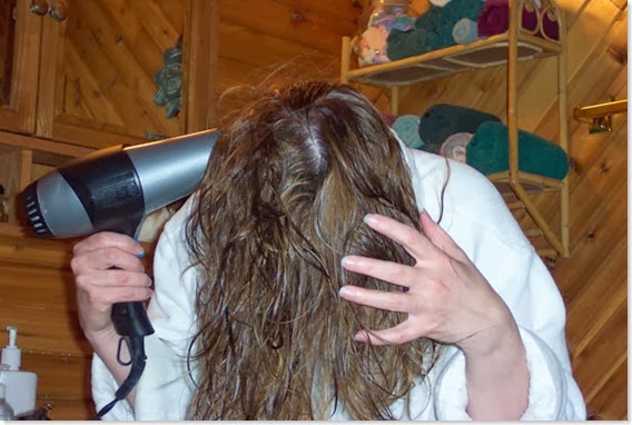 woman-drying-hair-hairdryer