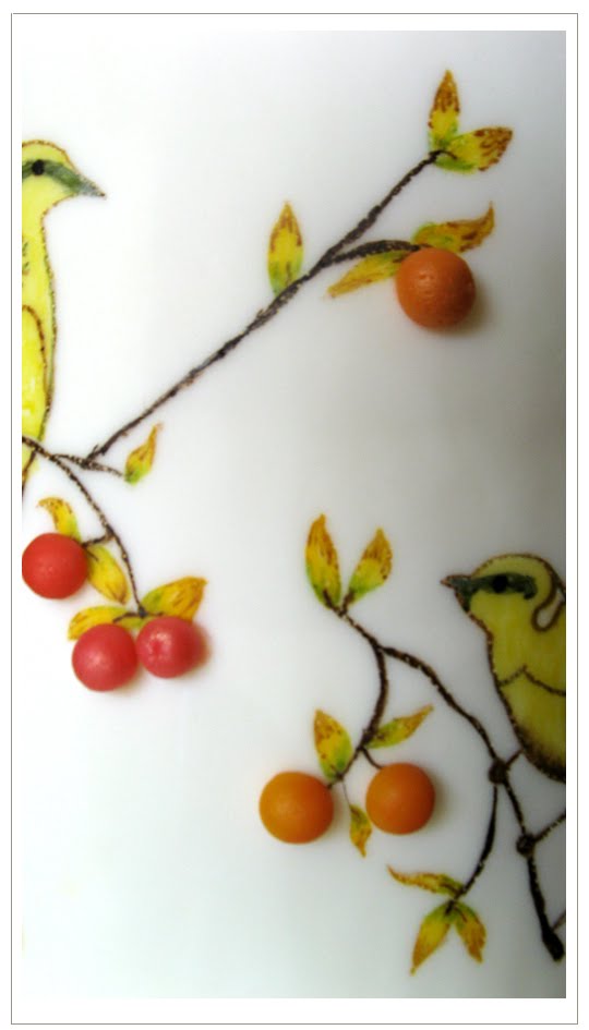 Amazing wedding cake featuring birds on a tree Tuscan birds and berries