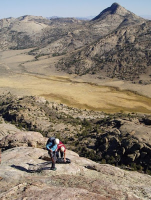 University of Wyoming researchers Davin Bagdonas and Carol Frost make observations on Lankin Dome, part of the Wyoming batholith, in central Wyoming's Granite Mountains.