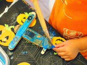 cardboard and popsicle stick biplanes- super easy!