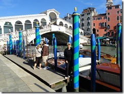 Elaine by a water taxi near Rialto Bridge Venice Italy