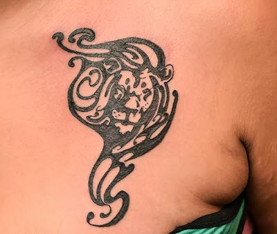 tribal lion tattoo for women