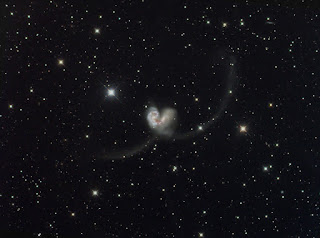Photo of the Antennae Galaxies with foreground stars.