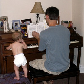 Elaine 10 months playing piano with Daddy