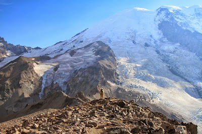 A Hiker Contemplates Steamboat Prow and Mount Rainier Glaciers