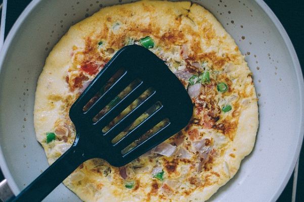 frying eggs in a pan