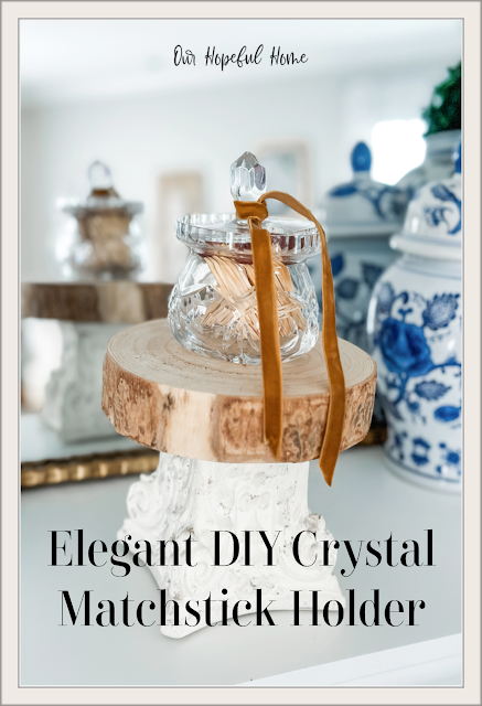crystal sugar bowl filled with matchsticks on rustic pedestal riser