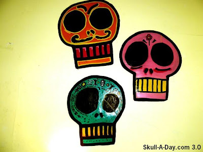  mexican skulls i made these with spray paint and cardboard to stick up 