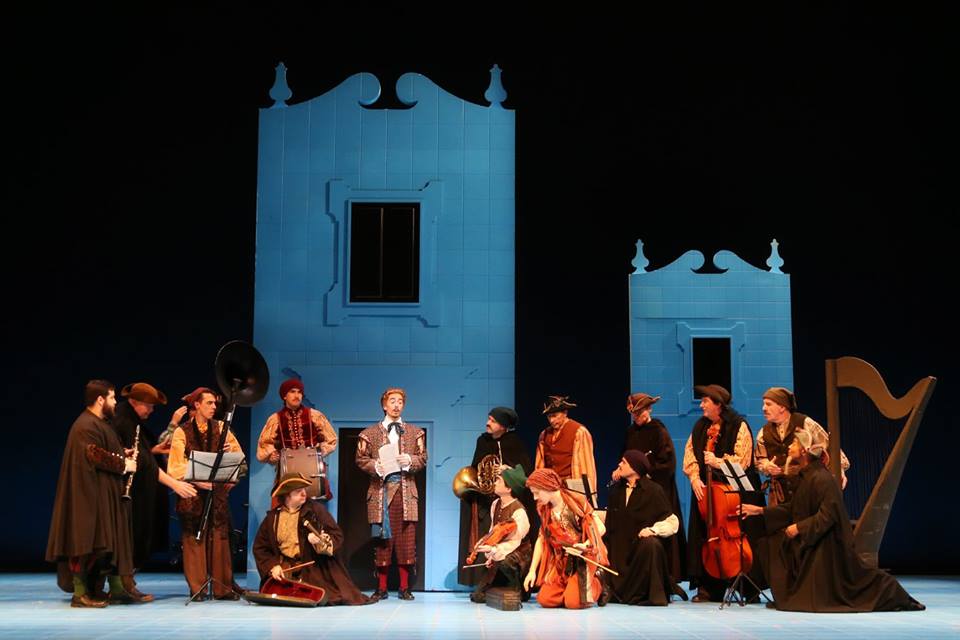 IN REVIEW: Baritone CHARLES HYLAND as Fiorello (center) in the opening scene of North Carolina Opera's production of Gioachino Rossini's IL BARBIERE DI SIVIGLIA, 1 April 2016 [Photo by Curtis Brown, © by North Carolina Opera]