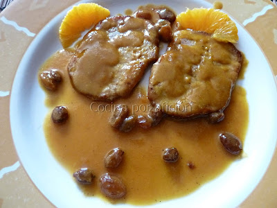 lomo de cerdo en salsa de naranja con pasas