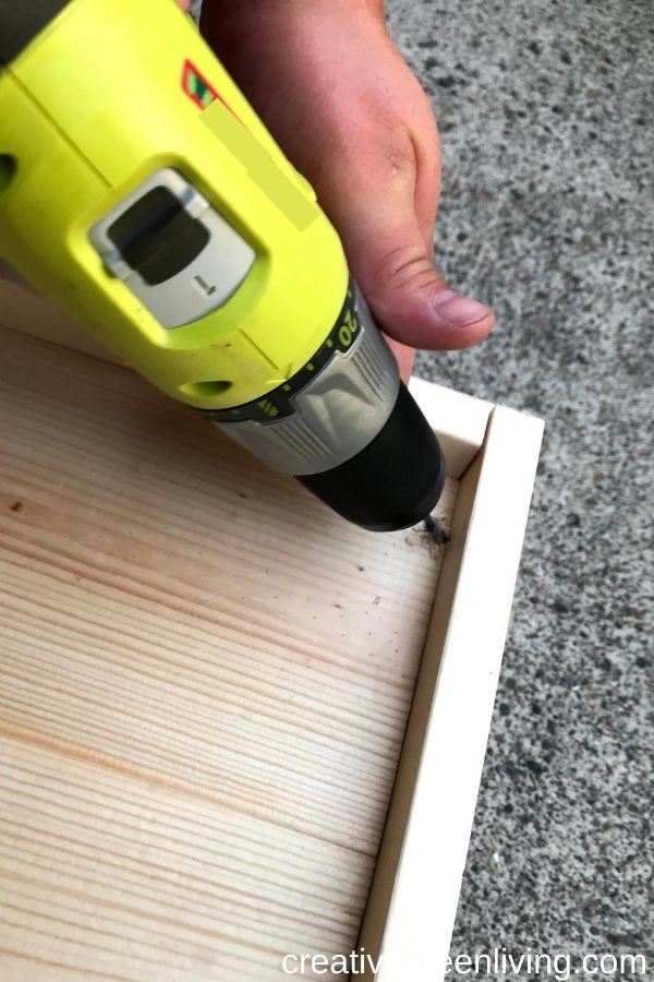 How to make a DIY Chicknic Table - free plans for how to build a chicken picnic table including step-by-step directions - how to drill holes in your chic nic table so it doesn't fill with water in the rain