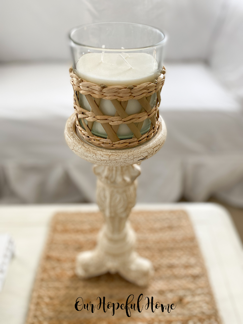 tall candle holder with willow wrapped candle