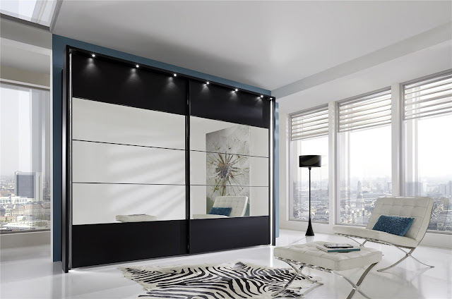 1. Black Sliding Wardrobe with Mirror Panel