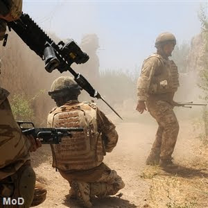 Obama Boosts Troops in Afghanistan with Exit Plan photo