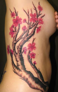Cherry Blossom Tattoo Designs With Image Female Tattoo With Japanese Cherry Blossom Tattoo On The Side Body Picture 2